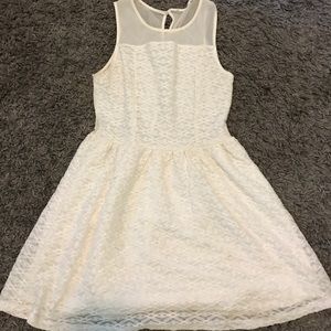 White skater dress with mesh cutouts